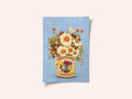 Flowers In a Vintage Tea Can