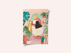Woman taking bath in pink tropical bathroom