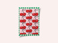 Red Cherries on a Pink