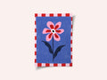Flower with Pink Petals and Striped Leaves