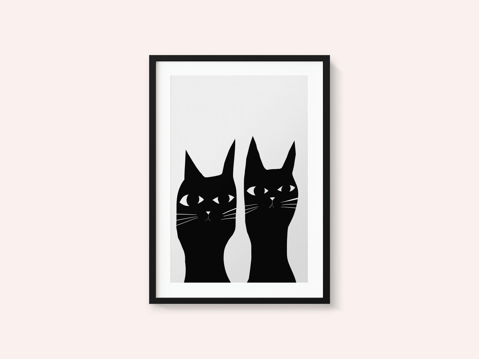 Two black cats
