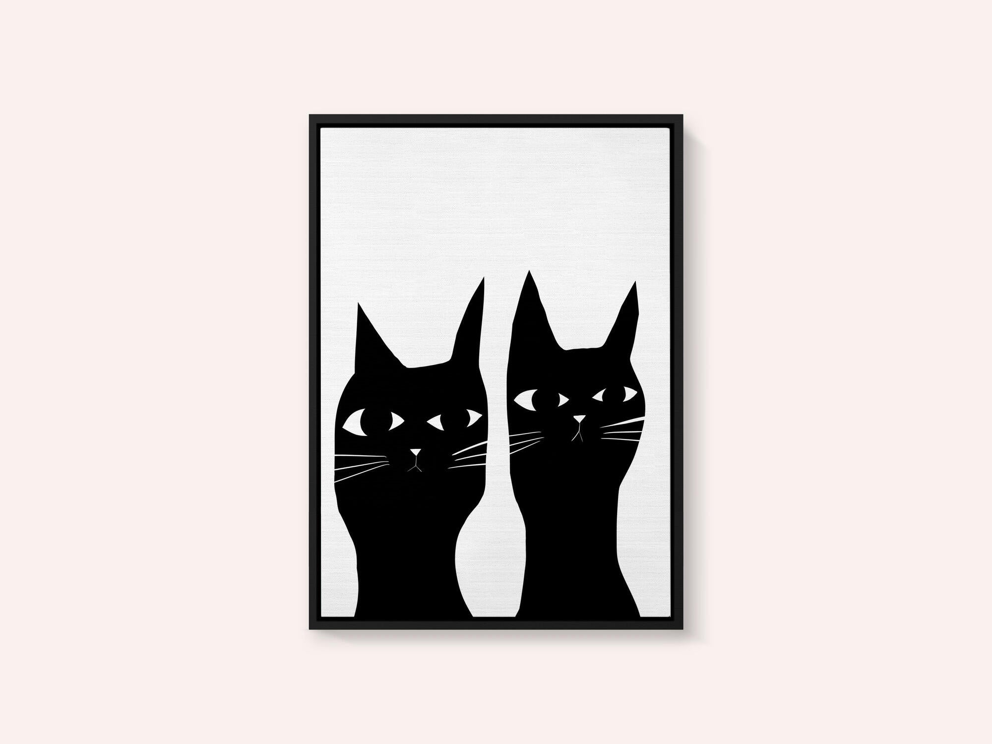 Two black cats