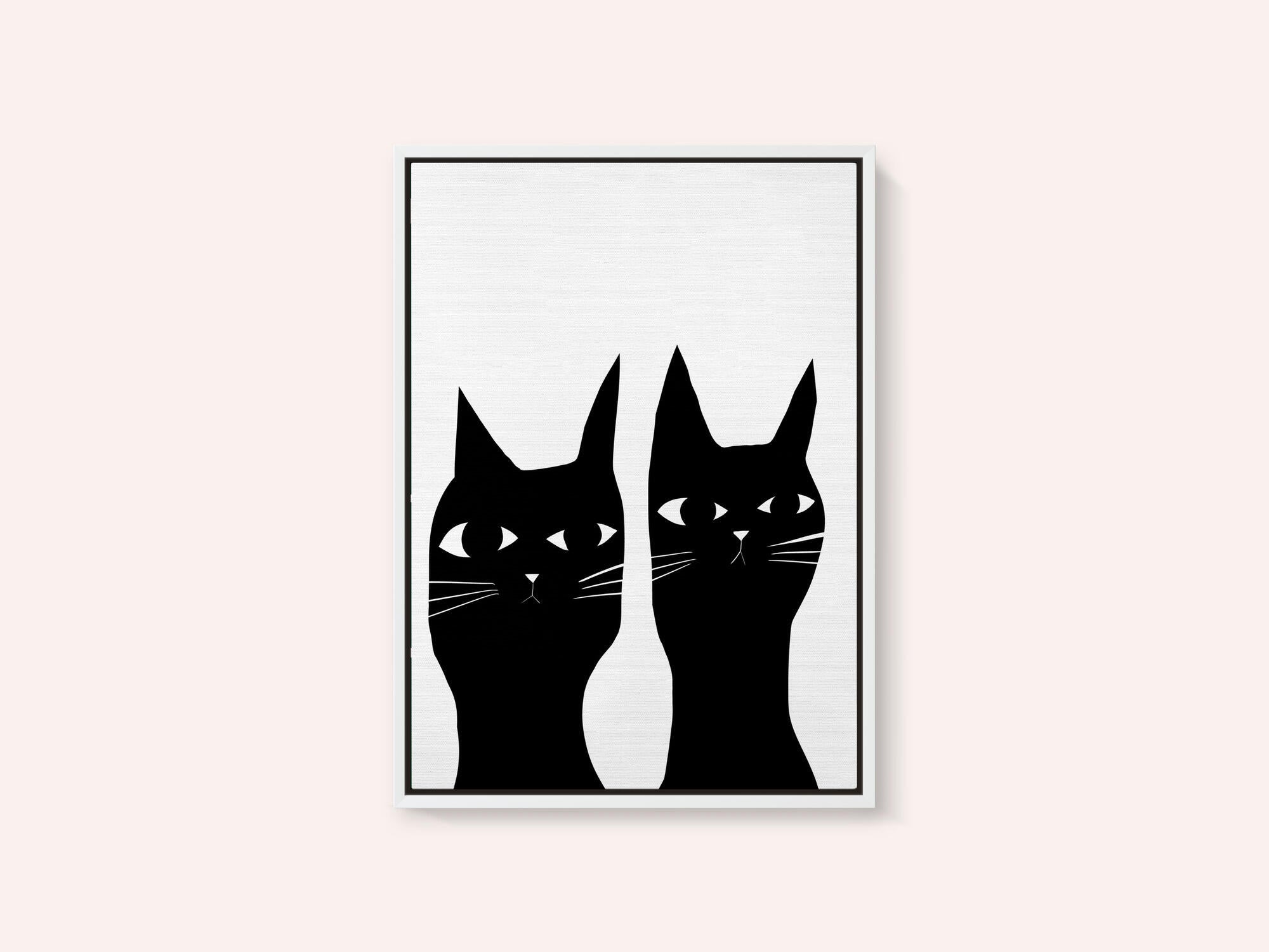 Two black cats