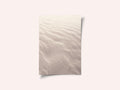 Neutral  colors sand pattern on the beach - nature and travel photography