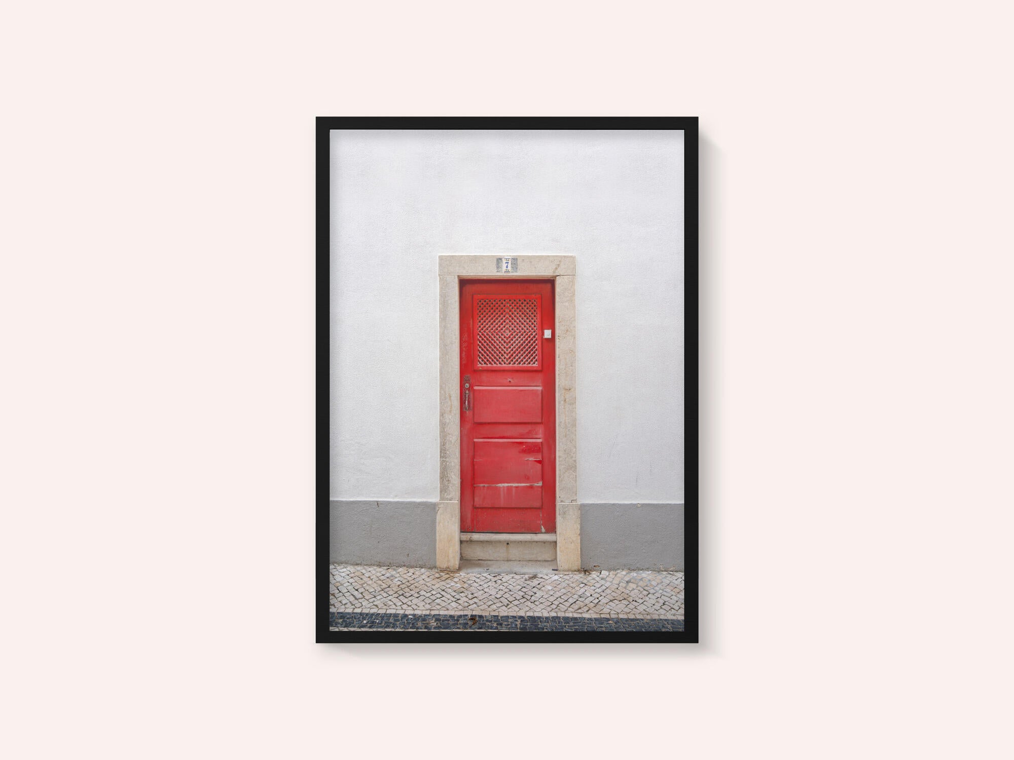 The red door nr 7 in Ericeira, Portugal - summer street and travel photography