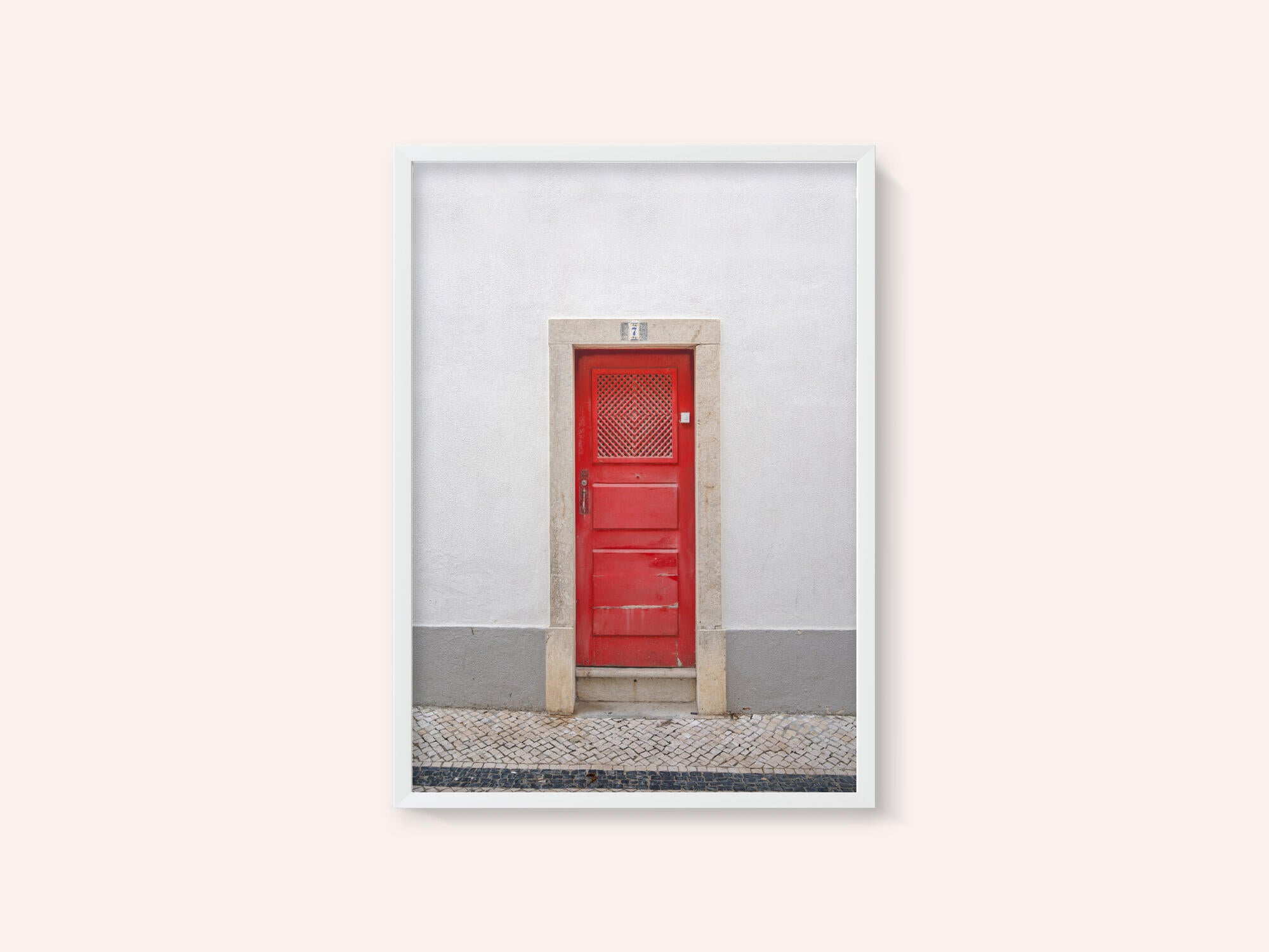 The red door nr 7 in Ericeira, Portugal - summer street and travel photography