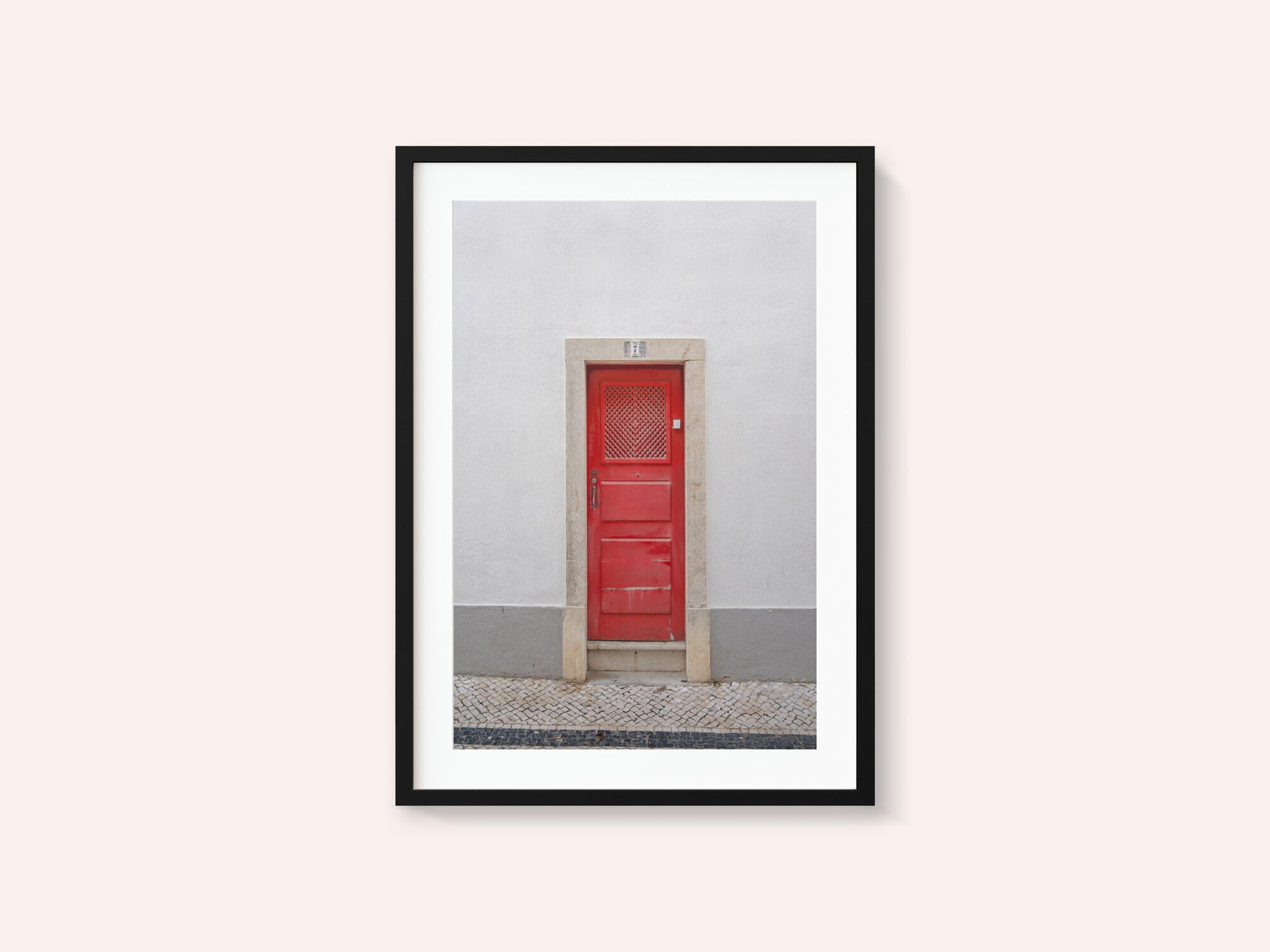 The red door nr 7 in Ericeira, Portugal - summer street and travel photography
