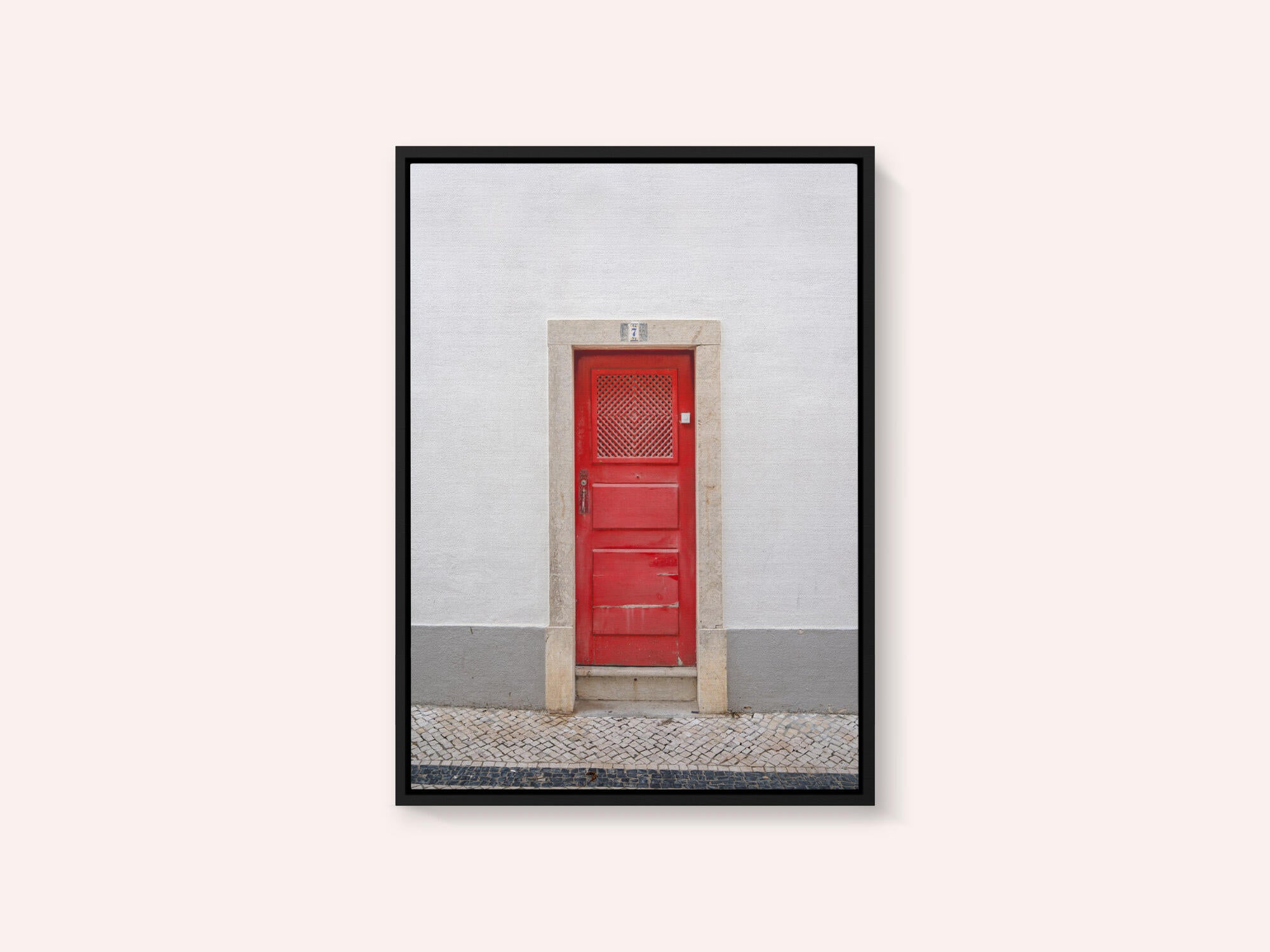 The red door nr 7 in Ericeira, Portugal - summer street and travel photography