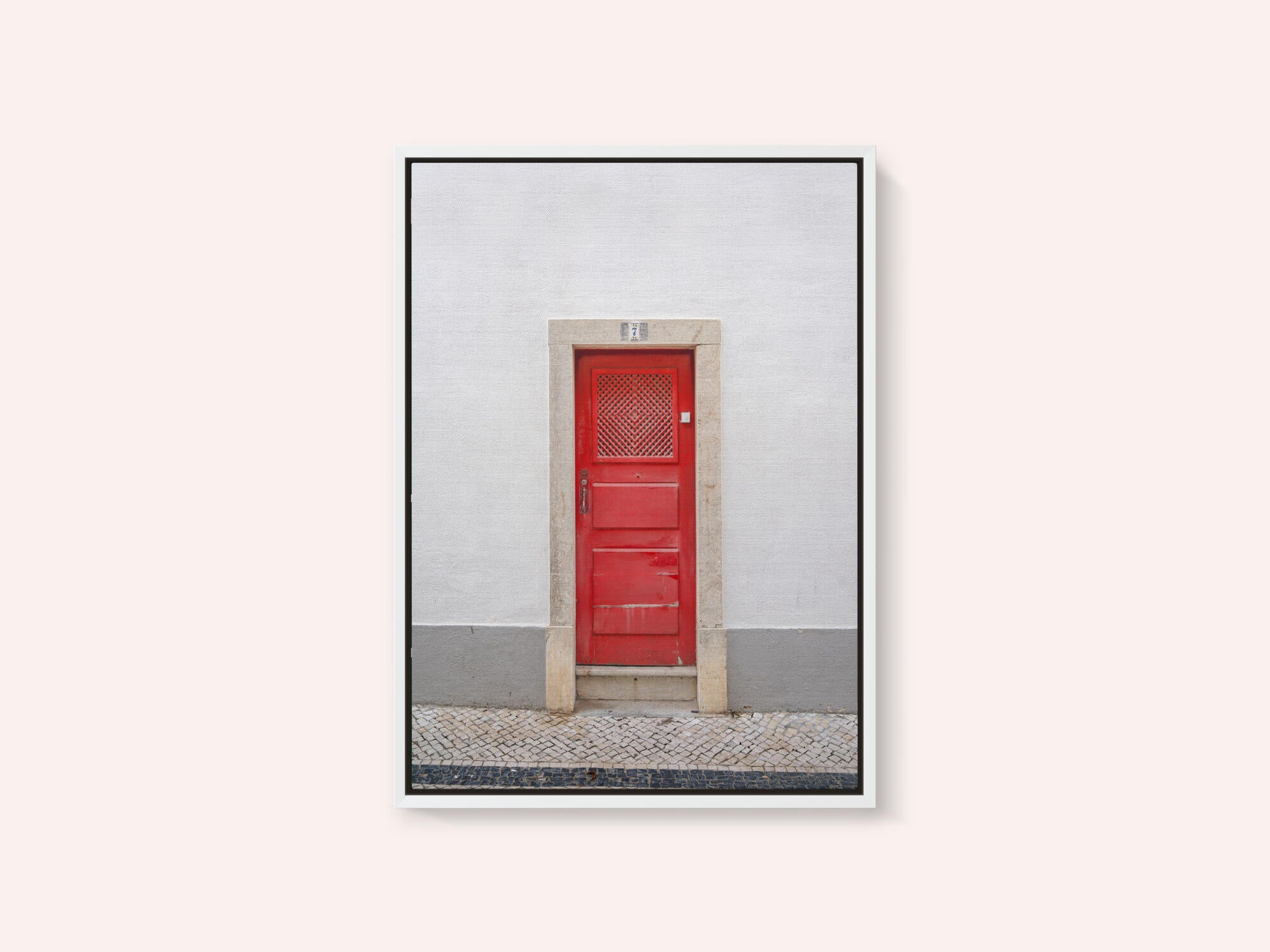 The red door nr 7 in Ericeira, Portugal - summer street and travel photography