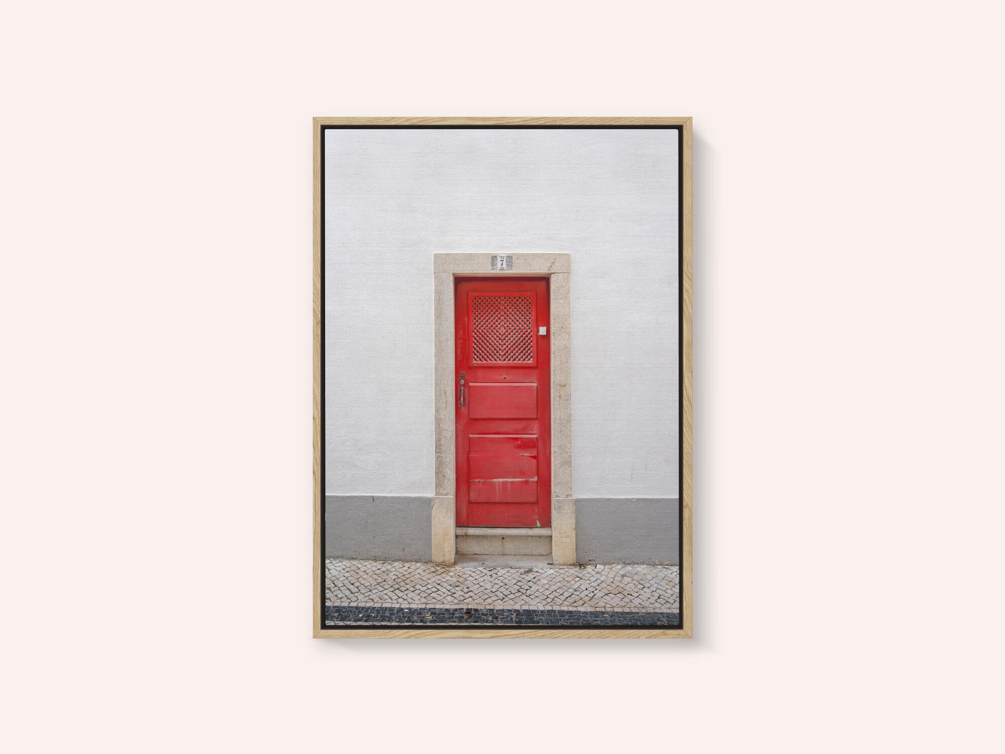 The red door nr 7 in Ericeira, Portugal - summer street and travel photography