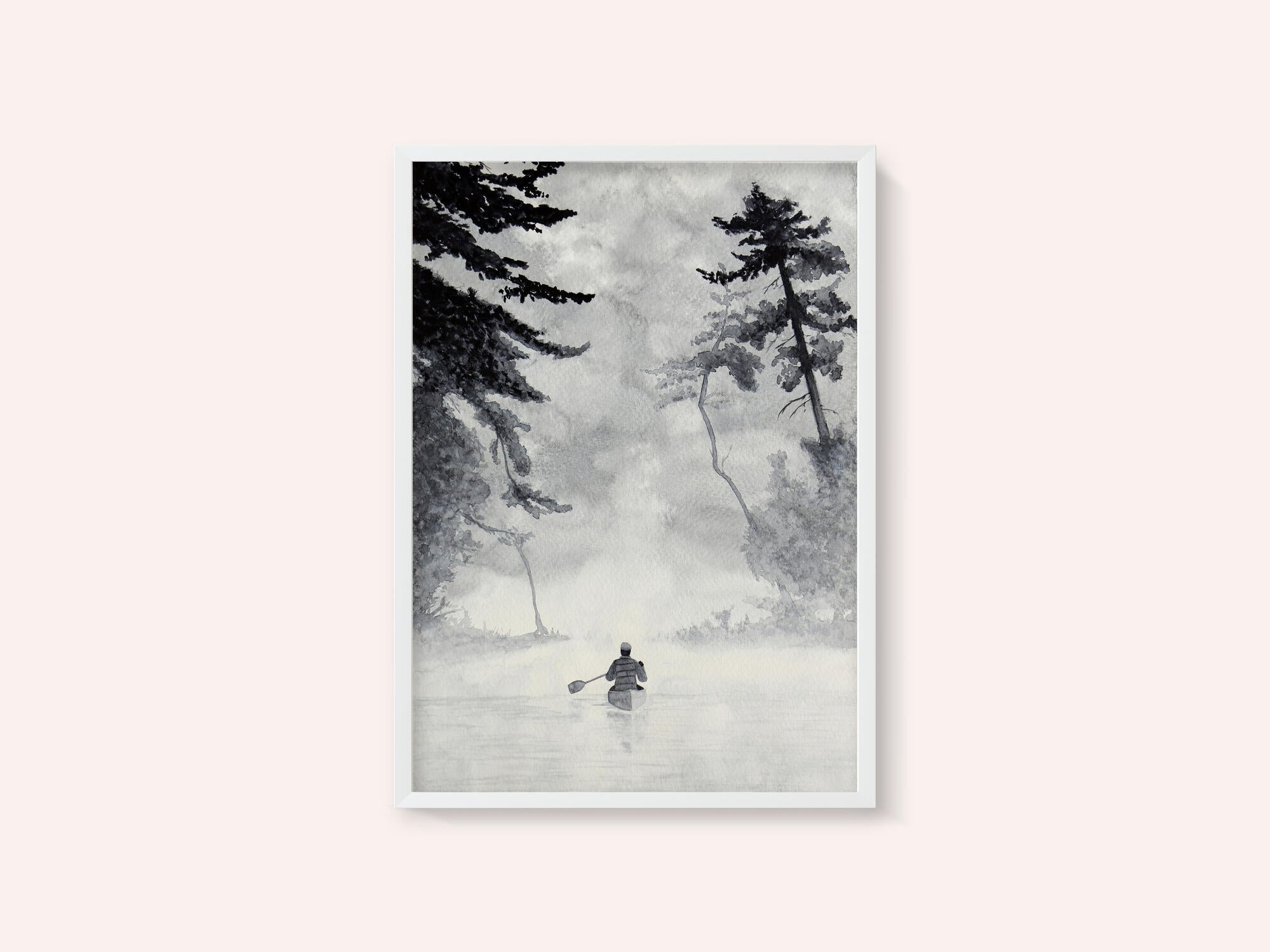 Man In a Canoe On Misty Water In a Forest Landscape