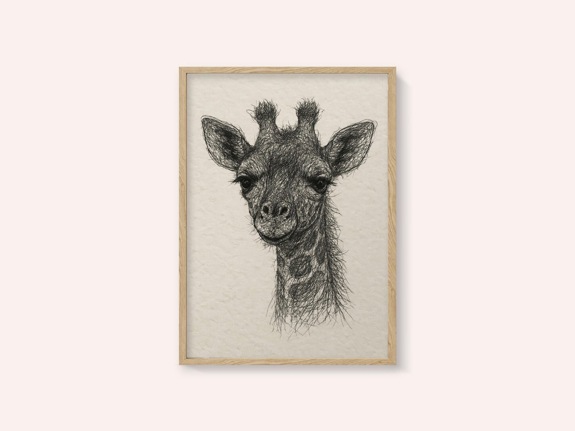 Thread portrait baby giraffe on handmade paper