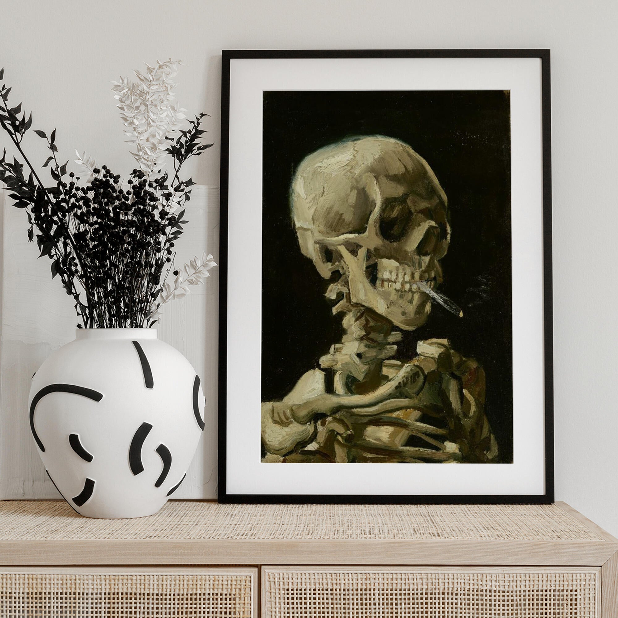 Head of a skeleton with a burning cigarette