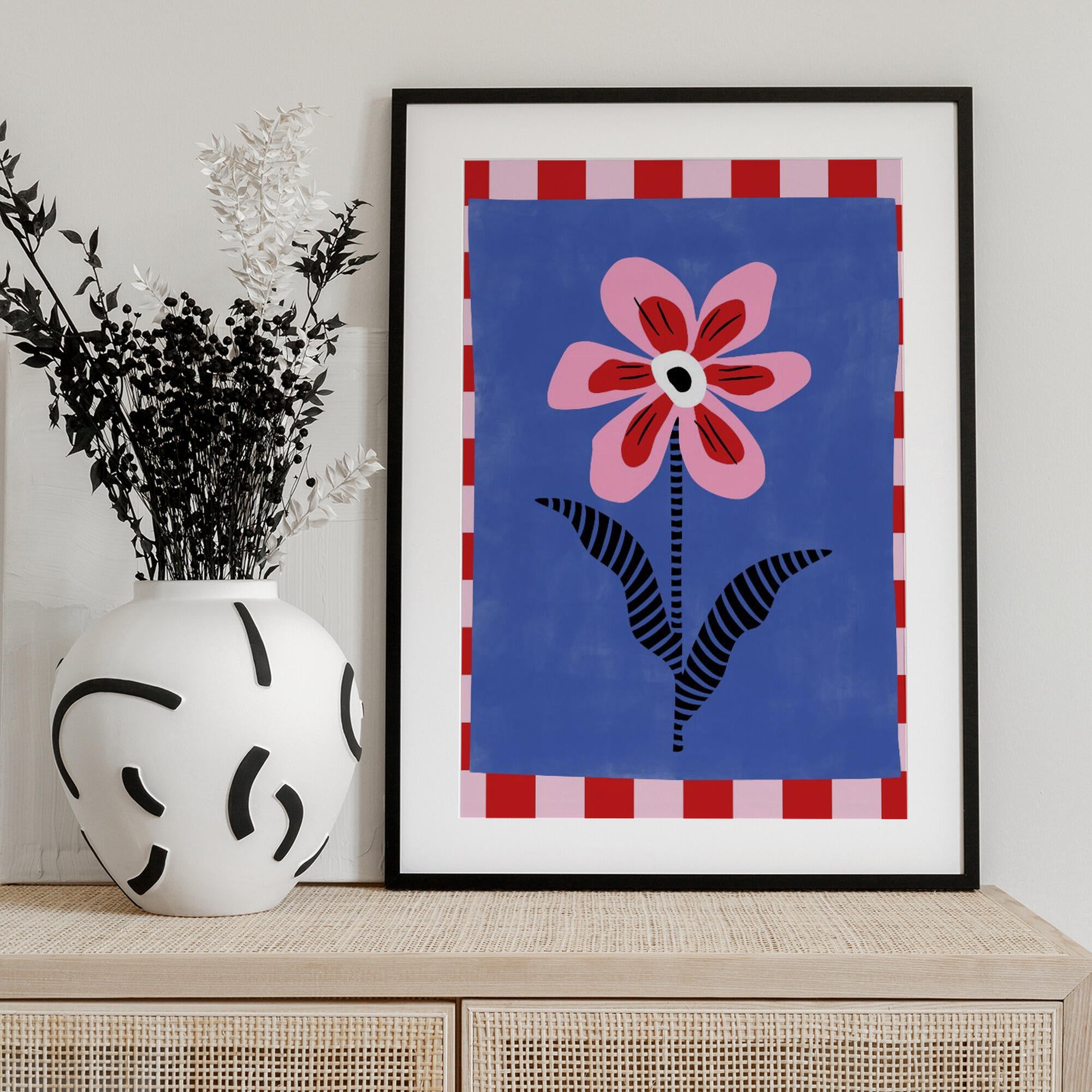 Flower with Pink Petals and Striped Leaves
