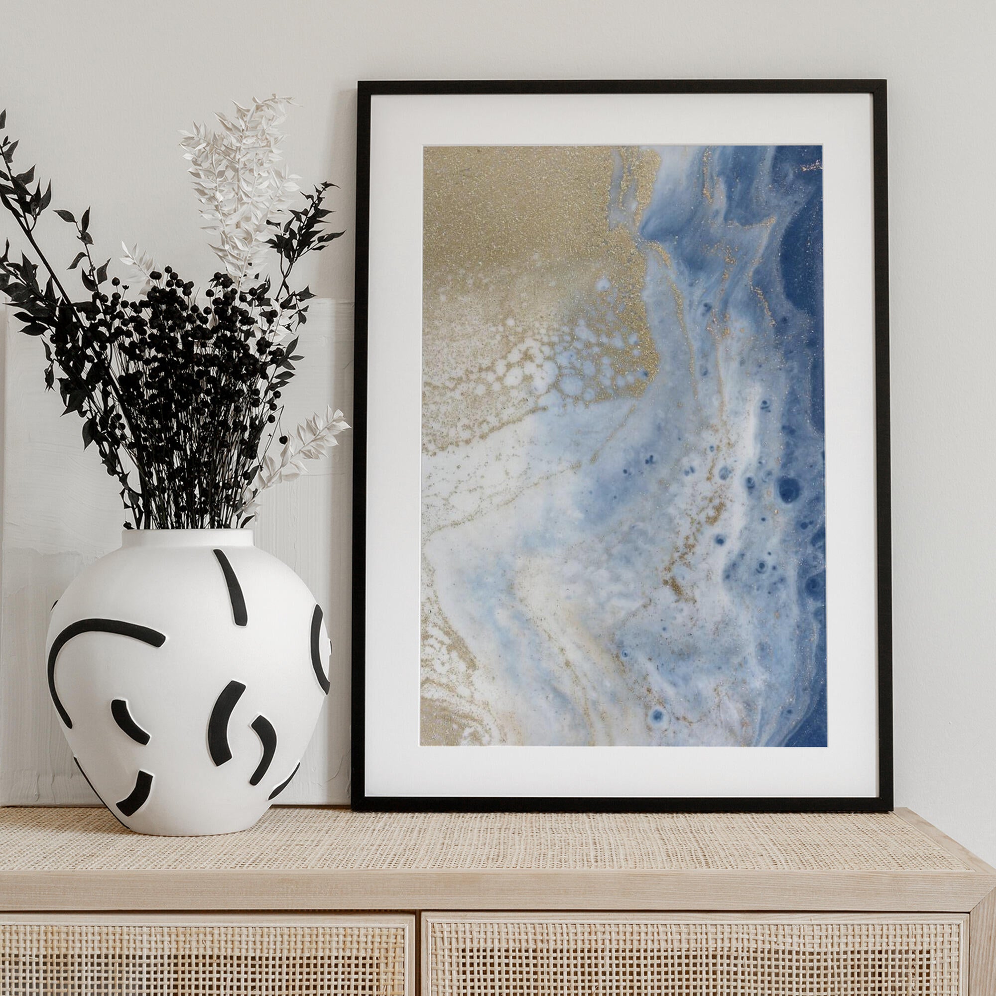 Swirling Blue and Gold Patterns Resembles a Cosmic Landscape