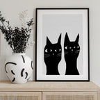 Two black cats