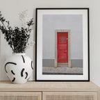 The red door nr 7 in Ericeira, Portugal - summer street and travel photography