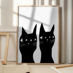 Two black cats