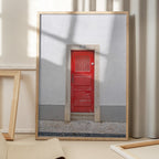 The red door nr 7 in Ericeira, Portugal - summer street and travel photography
