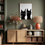 Two black cats