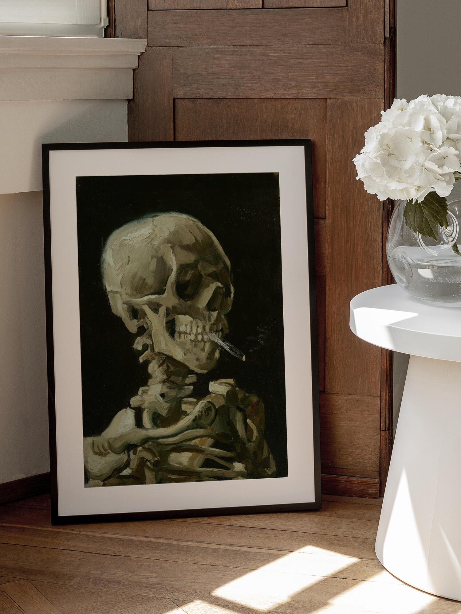 Head of a skeleton with a burning cigarette