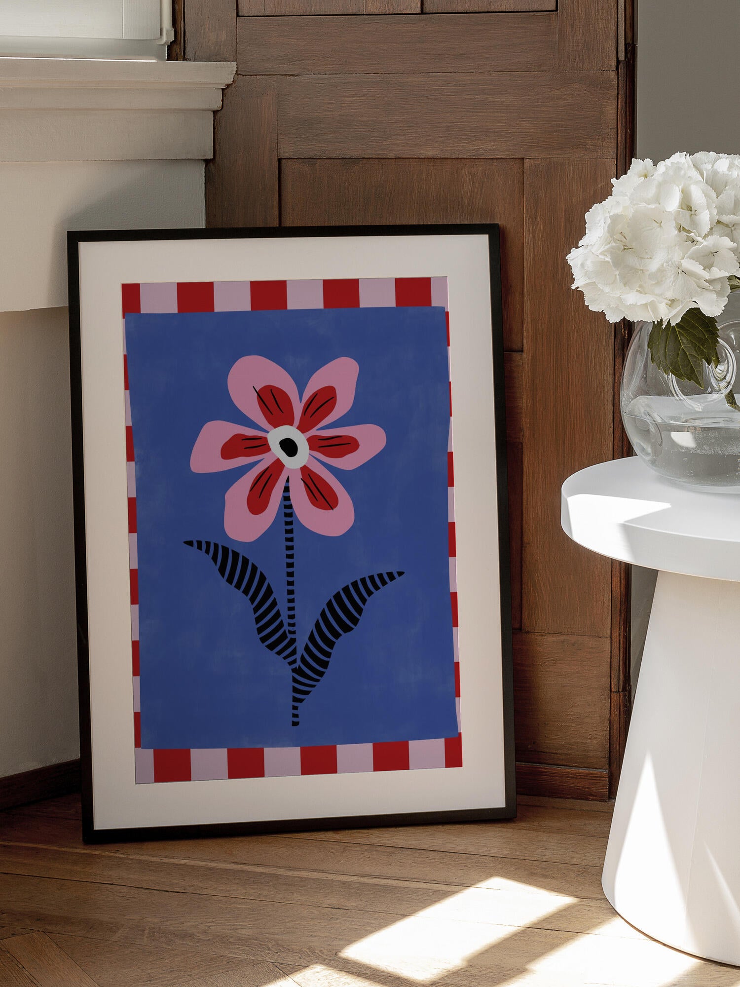 Flower with Pink Petals and Striped Leaves