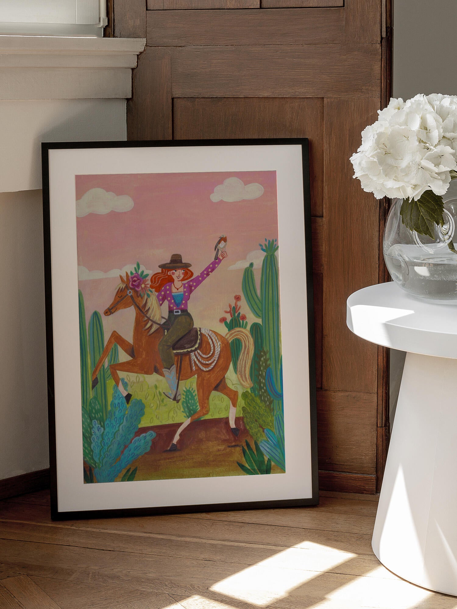 Cowgirl on horse in the desert