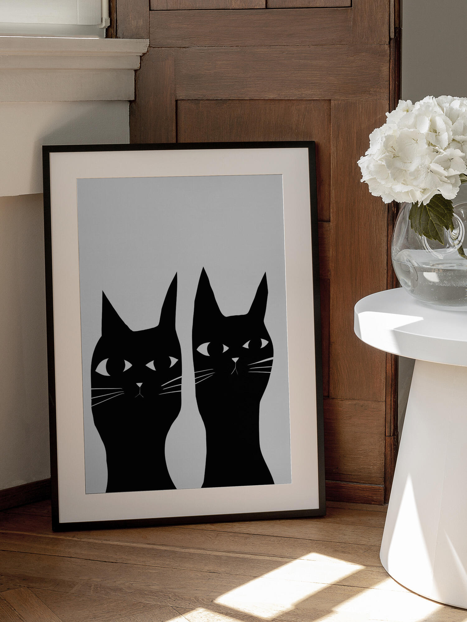 Two black cats