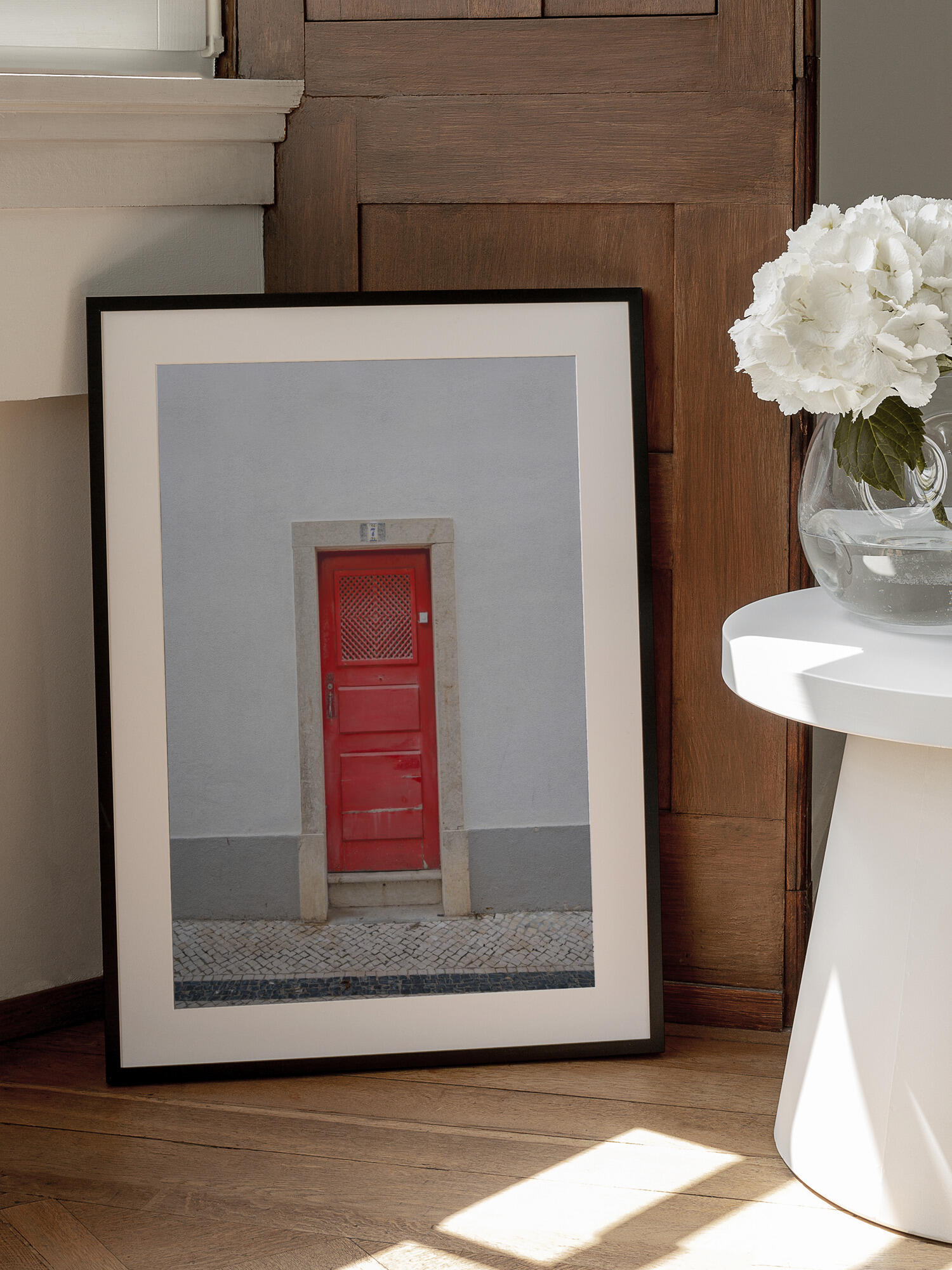 The red door nr 7 in Ericeira, Portugal - summer street and travel photography