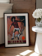 Dynamic Footballer in Red Stripes