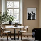 Two black cats