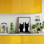 Two black cats