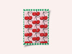 Red Cherries on a Pink