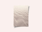 Neutral  colors sand pattern on the beach - nature and travel photography