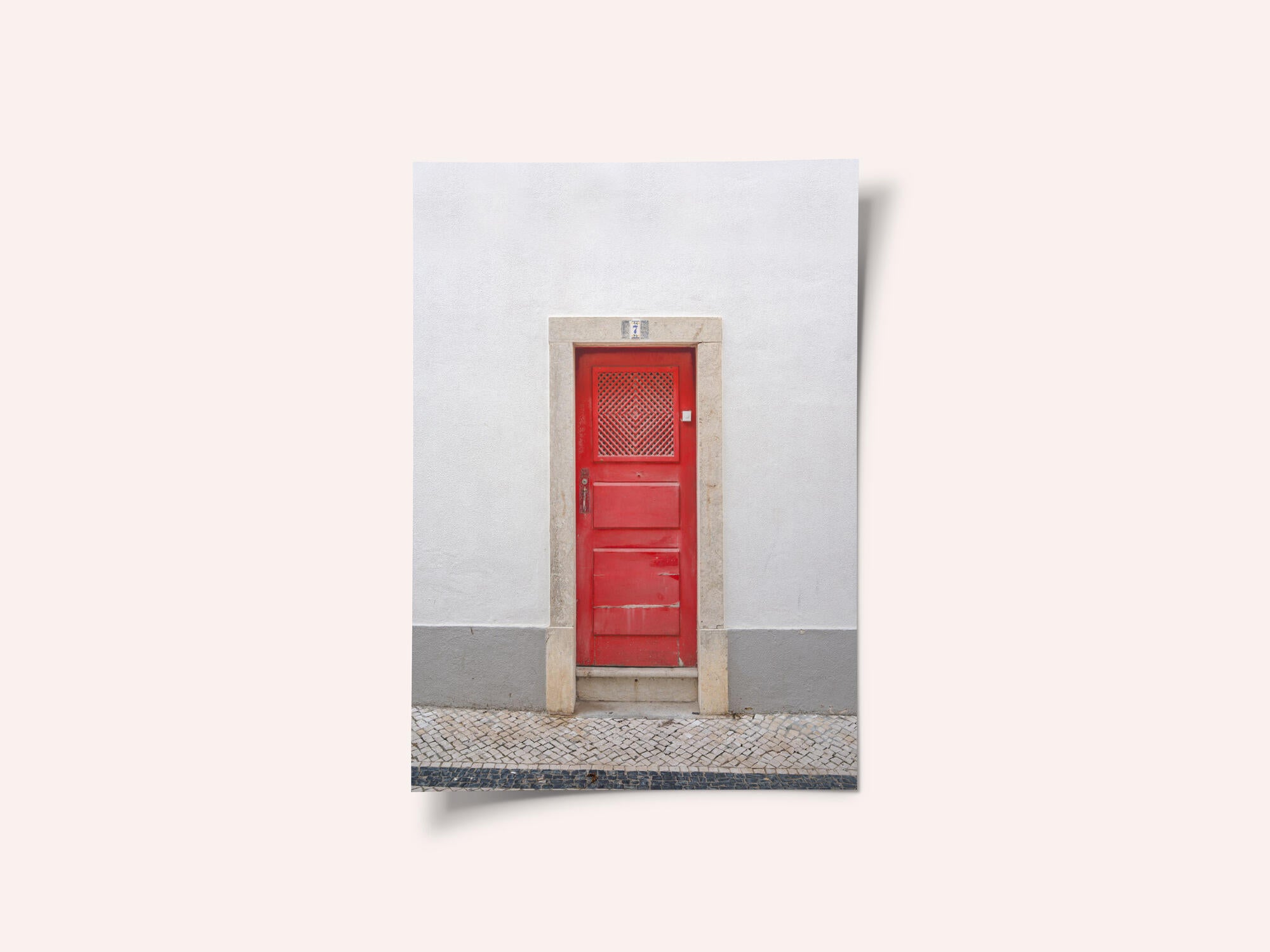 The red door nr 7 in Ericeira, Portugal - summer street and travel photography
