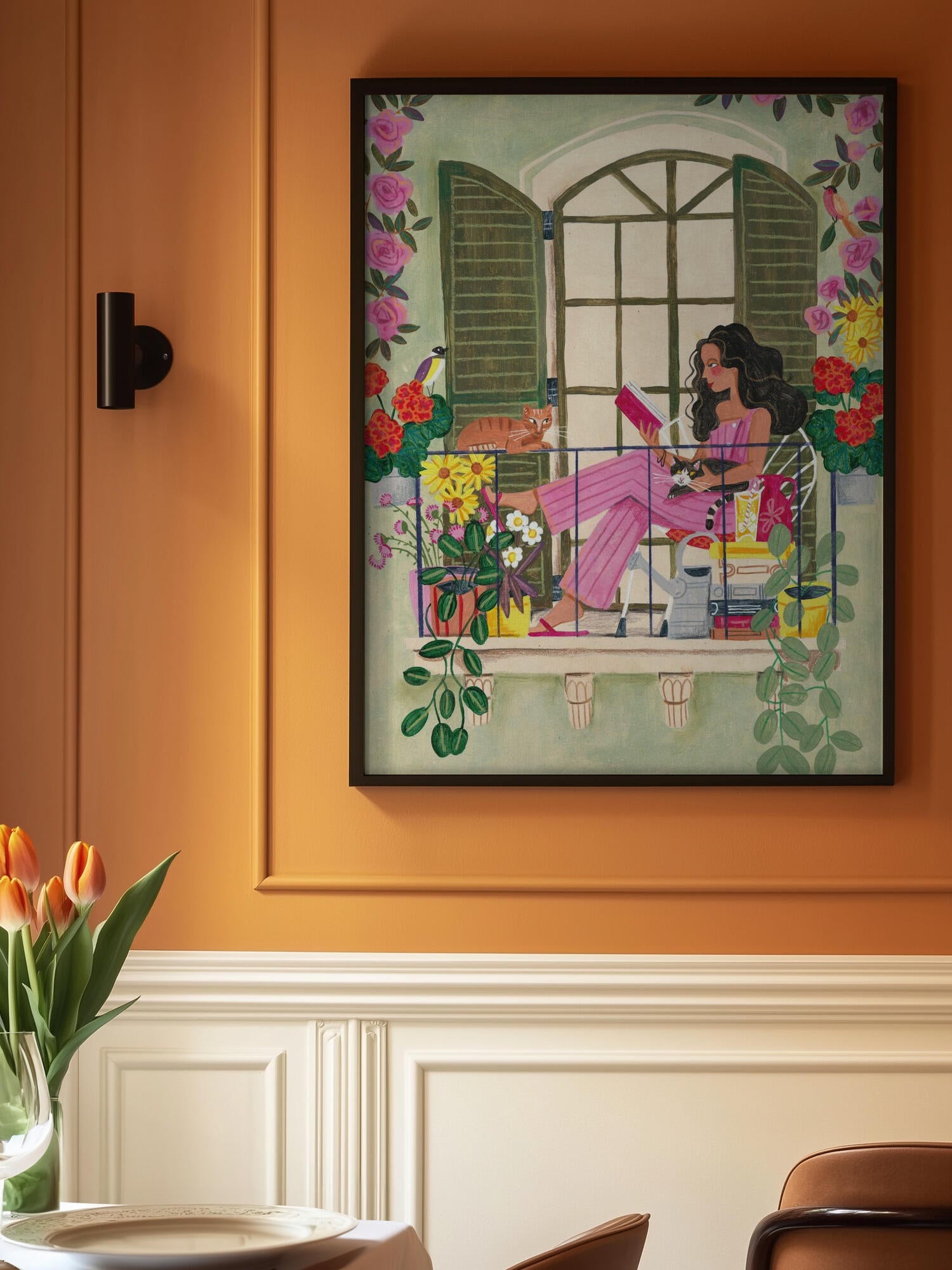 Woman reads on balcony