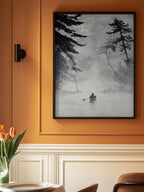 Man In a Canoe On Misty Water In a Forest Landscape