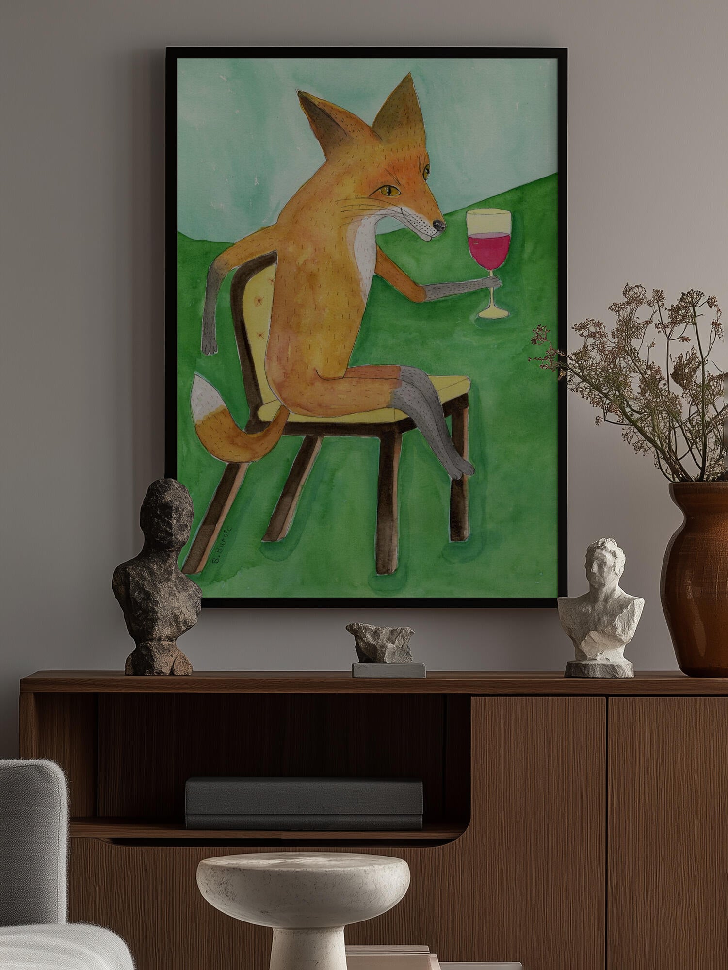 Mr. Fox drinking red wine