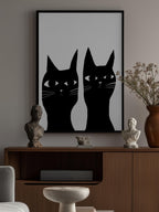 Two black cats