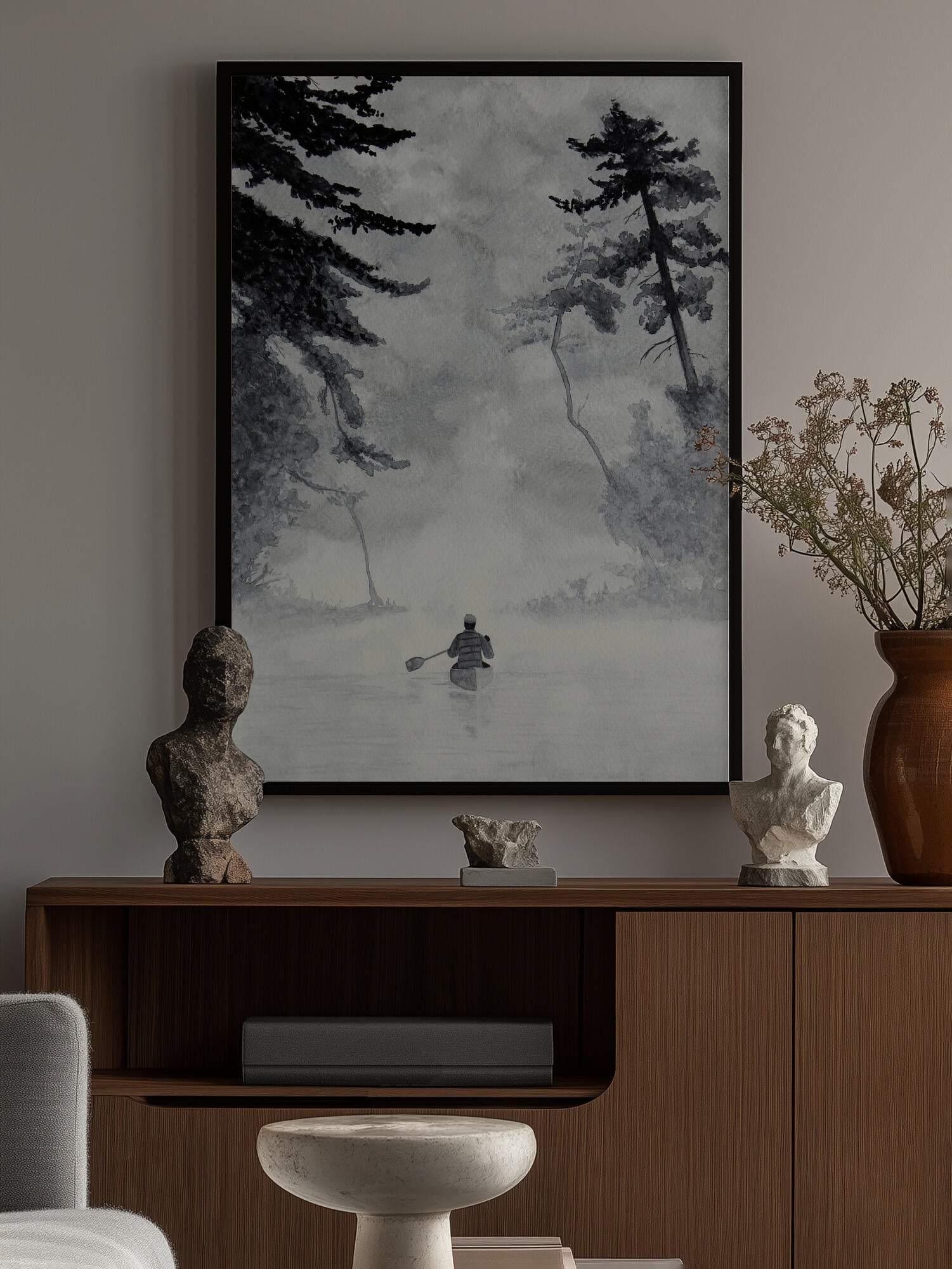 Man In a Canoe On Misty Water In a Forest Landscape